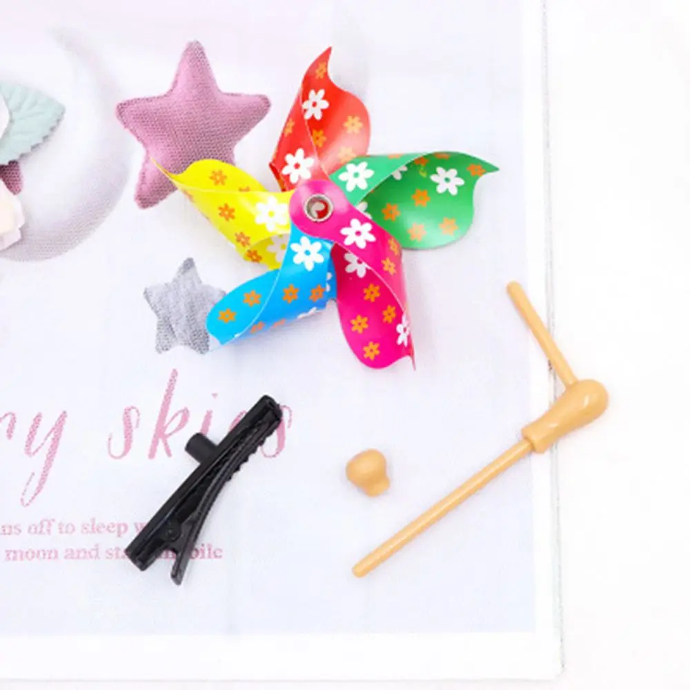 Fermaglio capelli arcobaleno a mulino per bambina molletta dolce_voghion.com