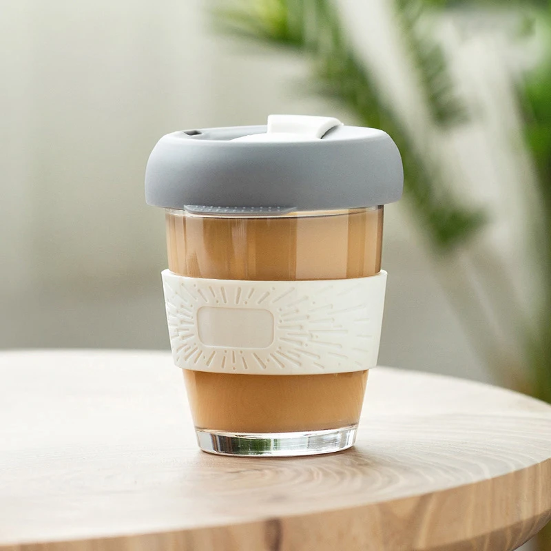 https://ae01.alicdn.com/kf/H1ecb897d0cce44a8b1f4a00059ae2a0bG/350ml-Coffee-Cup-Portable-Handy-Milk-Glass-Silicone-Cover-Resistant-Direct-Drinkingwater-Cup-Breakfast-Coffee-Cup.jpg