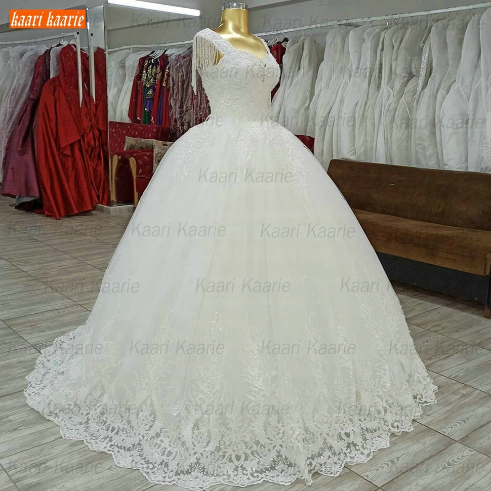 

Luxury Ivory Wedding Gowns Lace Up 2020 hochzeitskleid White Sleeveless Appliqued Tulle Fluffy Ball Gown Bridal Dresses Arabic