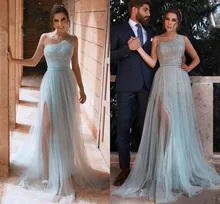 

Sparkly Arabic Dubai Prom Dresses 2021 Bling Bling Sequin Tulle Ice Blue One Shoulder Sexy Slit Formal Evening Party Gowns