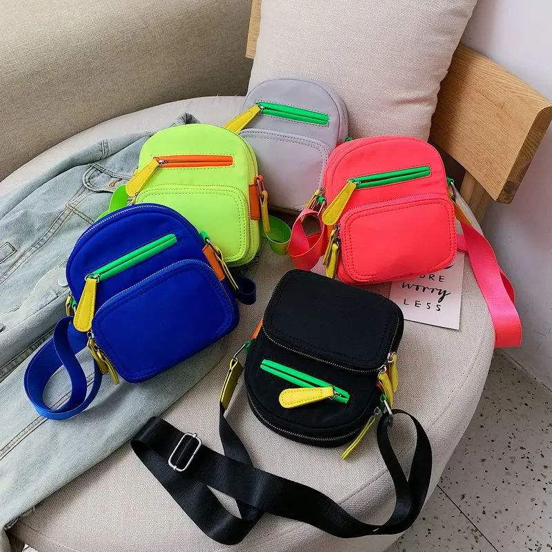 

2019 new candy color fluorescent canvas small square bag transverse zipper single shoulder oblique span woman bag
