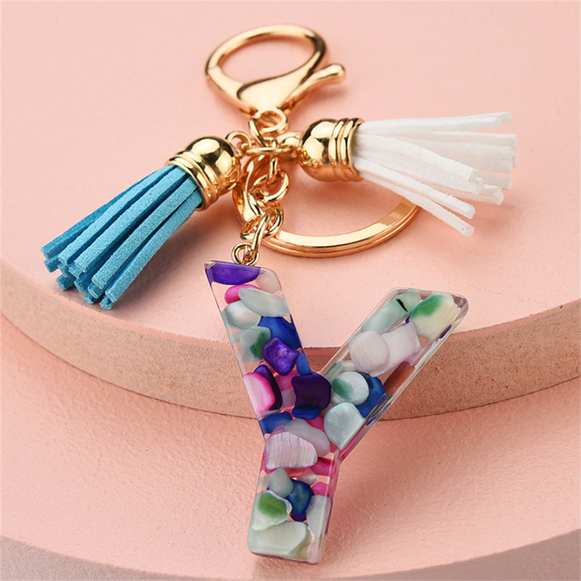 Women Keychains 26 Glitter Hollowed-out Words Handbag Tassel English Letter Keyring with Puffer Ball Charms Free Shipping