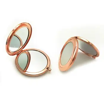 

Portable Solid Color Metallic Round Shape Makeup Pop-Up Dual-Side Mirror Pop-up designed makes it easy to be opened by one hand