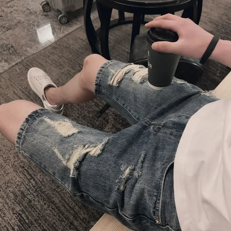 

Men's shorts 2020 spring new slim-fit, solid color, ripped, fur-trimmed shorts, loose, casual, personalized, young men's wear