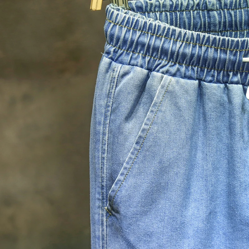 Reviews Blue large size jeans men's plus size Overalls pants autumn elastic stretch feet trousers Fashion Large Size Elastic waist 7XL