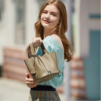 

2020 new Korean version of the niche litchi pattern first layer cowhide leather women's handbag bucket bag tote bag