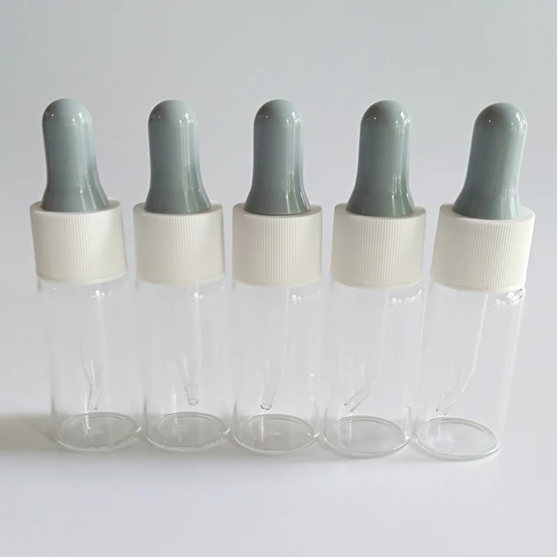 

12pcs/lot glass bottle 10ml cute tiny small Essence glass jars with pp rubber lid Essential oil bottle