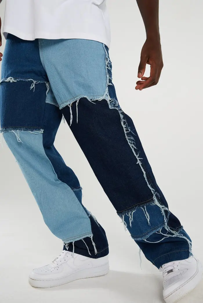 Pantalones de mezclilla para hombres, Vaqueros informales ajustados de retales de ajuste negro y azul, vaqueros de estilo motero Hip Hop para hombres, pantalones vaqueros holgados 2020