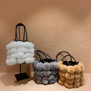 

New high quality leather fashion trend personality multi ball stitching with hair handbag rabbit hair hand bag for women