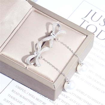 

S925 Sterling Silver Woman Stud Earrings Classic Boutique Jewelry Bow Tassel Inlaid Zircon Temperament Female Earrings