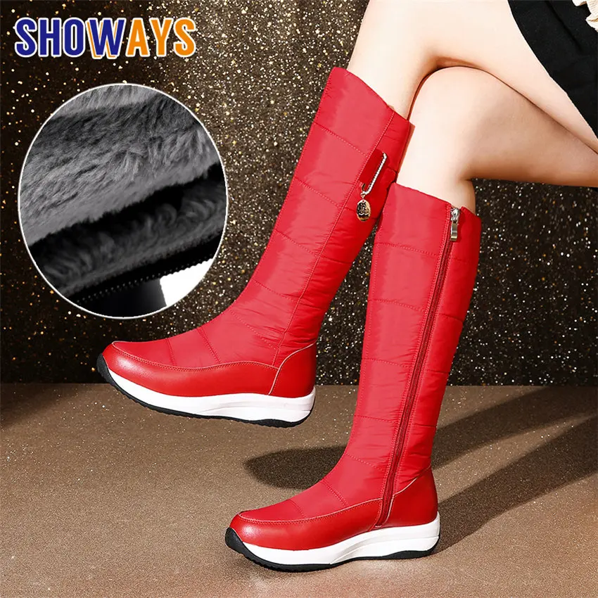 red leather knee high flat boots