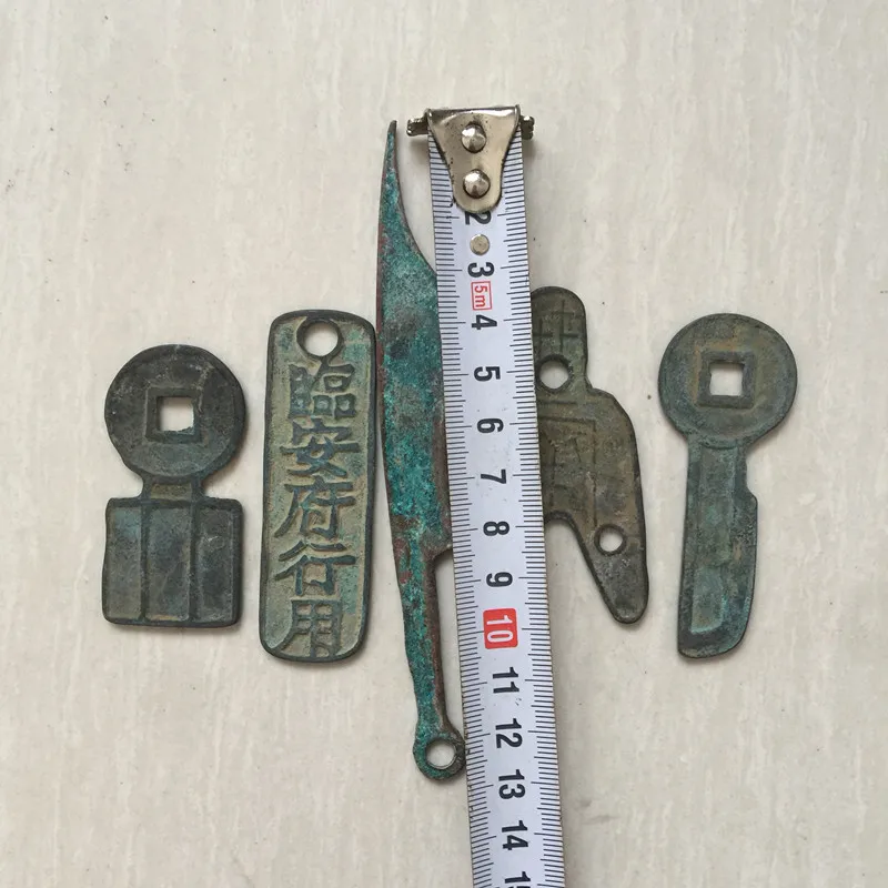 Three-hole coin, a set of five coins, a set of five parts 4