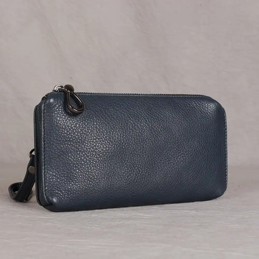 small blue clutch bag