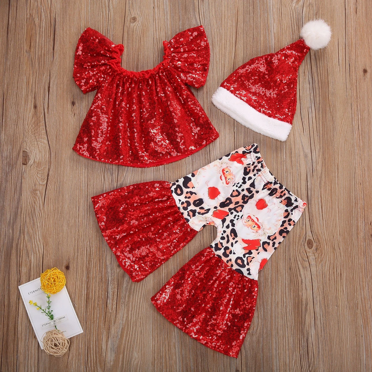 

Infant Baby Girl Christmas Suit Solid Flare Sleeve Top Print Pants with Cute Santa Cap 3pcs
