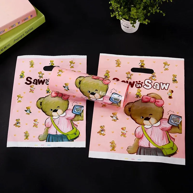 100 Stks/partij 25x3 5 Cm/30X40 Cm Roze Cartoon Plastic Gift Bag Groothandel Winkelen Kleding Verpakking Handvat tassen Hoge Kwaliteit 100 Stks/partij 25x3 5 Cm/30X40 Cm Roze Cartoon Plastic Gift Bag Groothandel Winkelen Kleding Verpakking Handvat tassen Hoge Kwaliteit