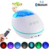 Eshoo Night Light Projector With Music Player Bluetooth 5.0 Lucky Stone Ocean Wave Projector 12 LED 8 Colors Remote Controled 1