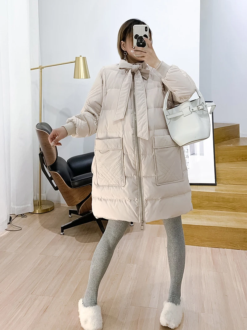 YNZZU зимняя новая негабаритная Женская пуховая куртка, однотонный милый галстук, воротник-бант, утиный пух, пальто, карманы, женская одежда, A1187