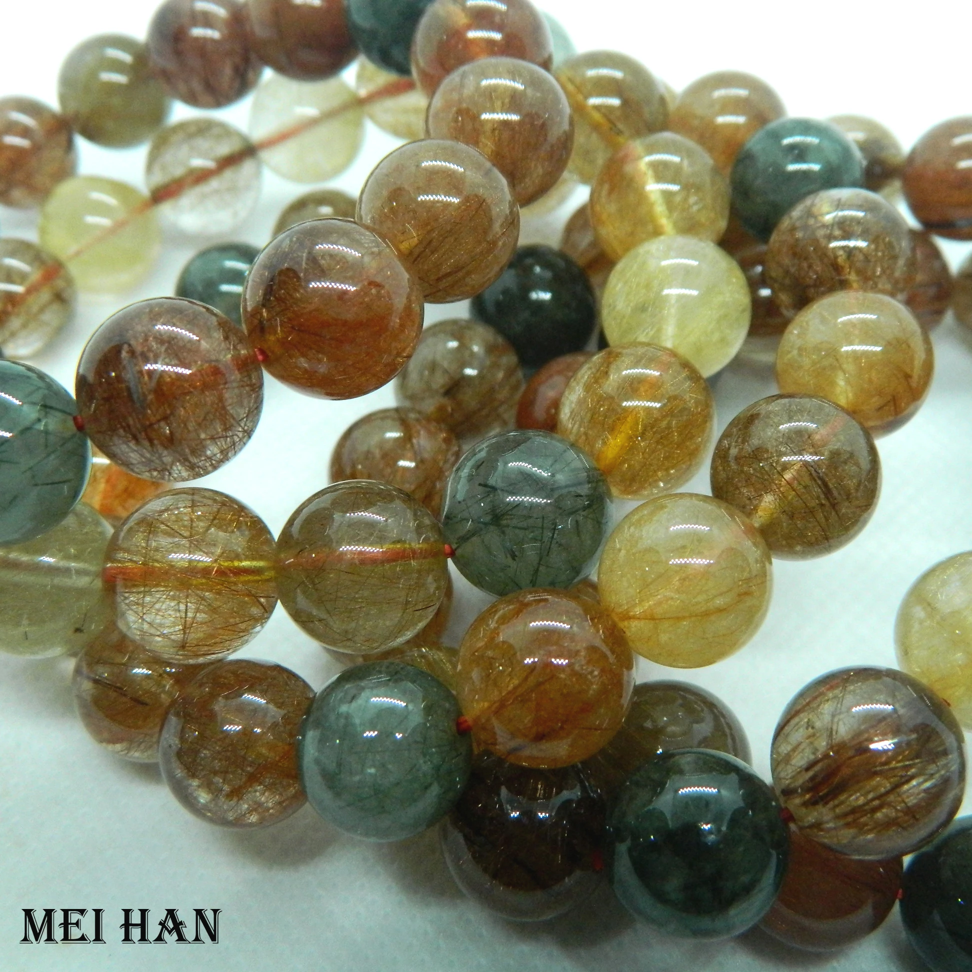 

Meihan free shipping (17beads/set/45g) natural Brazil 12-12.5mm A+++ rutilated quartz smooth round beads stone