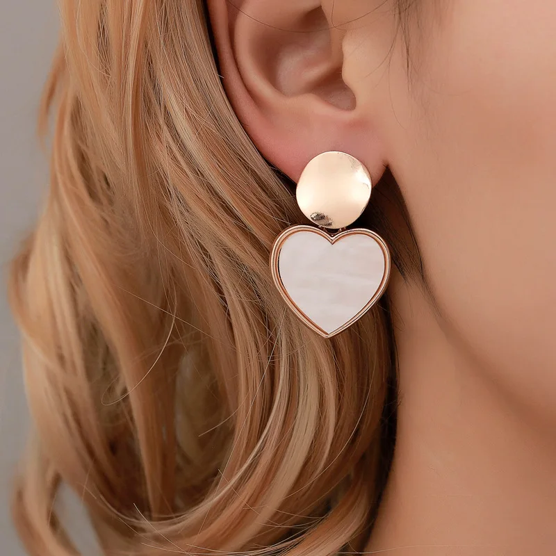 

Small fresh earrings simple geometric love earrings personality hollow round metal pendant girl heart earrings