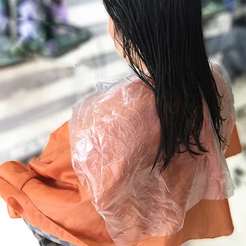 

200pcs Disposable Hairdressing Capes PE Waterproof Apron Cutting Dye Hair Cape Barber Transparent Hairdressing Cloth