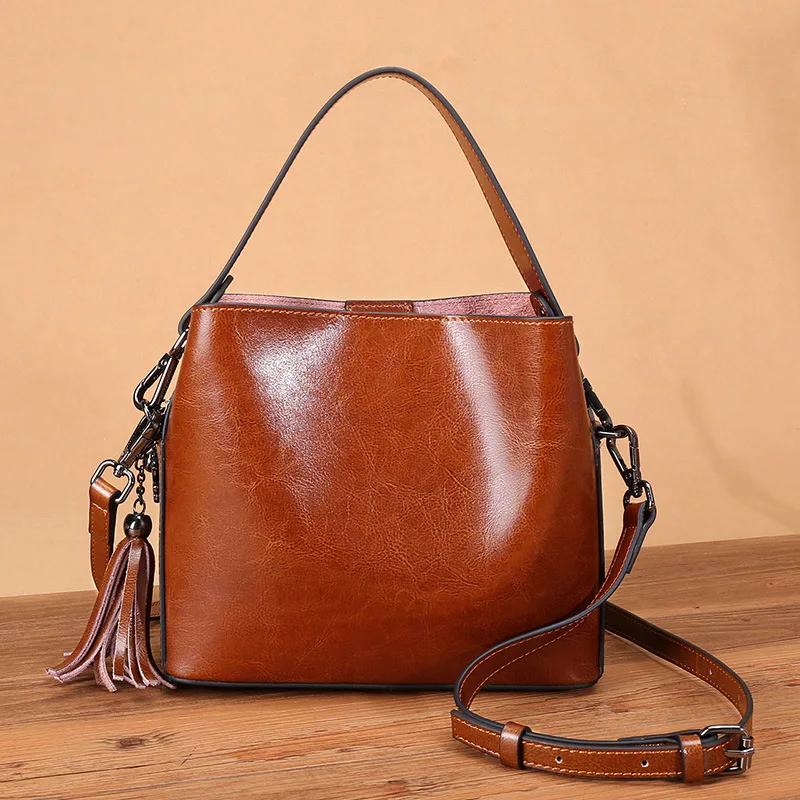

Genuine leathe women bag new leather Messenger bag tassel single shoulder bags portable handbag GN-SB-stnpnb