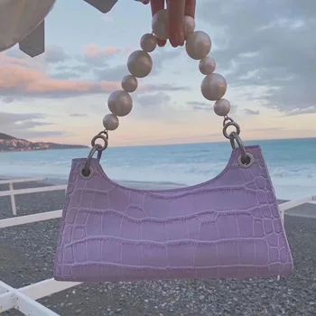 

Retro crocodile pattern design taro purple armpit bag female 2020 spring and summer new wild pearl shoulder bag