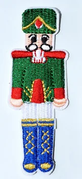 

Christmas Nutcracker Green Dress Embroidered Iron On Applique Patch ~ British Soldier Standing (Size is about 3.5 * 9 cm)