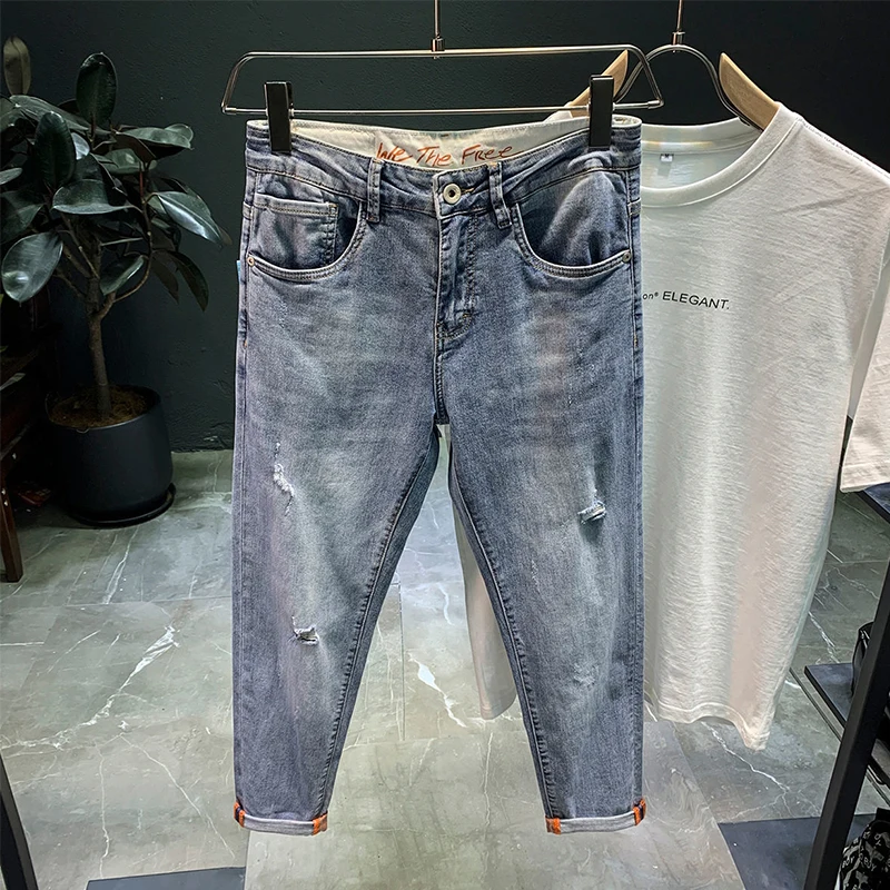 Ripped Denim jeans men's trendy brand loose summer thin elastic feet pants men's Korean harem teenagers cropped pants