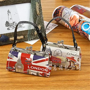 

New European and American fashion ladies pu leather retro printed handbag coin coin purse. Children's bag.