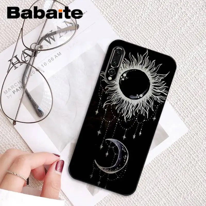 white sun Moon stars