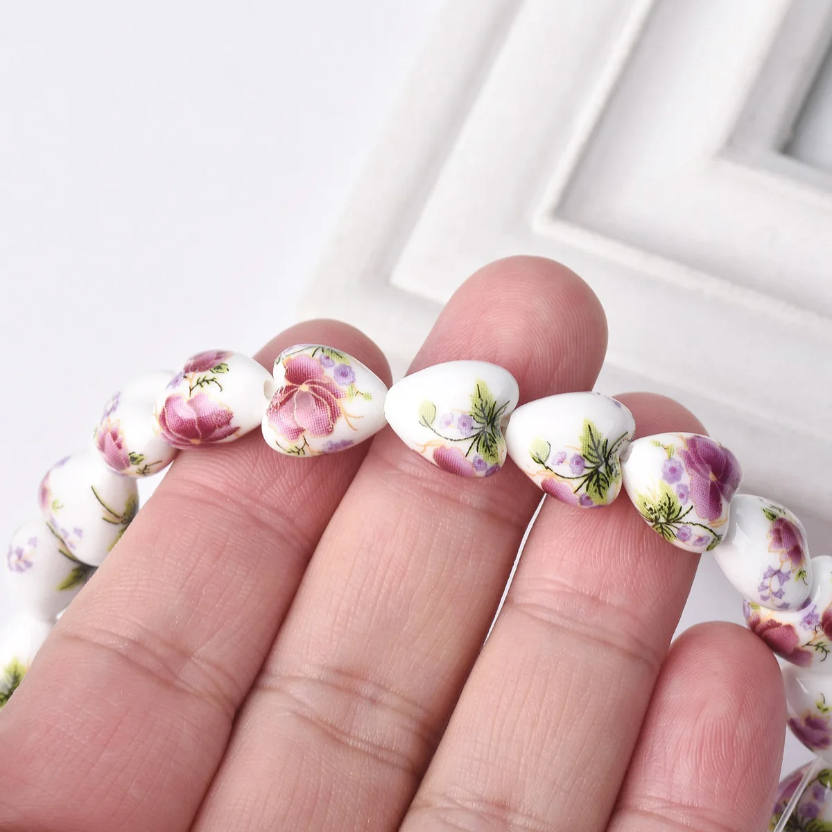 10 pçs 13x12mm forma do coração padrões de flores cerâmica porcelana solta artesanato contas lote para fazer jóias conclusões diy