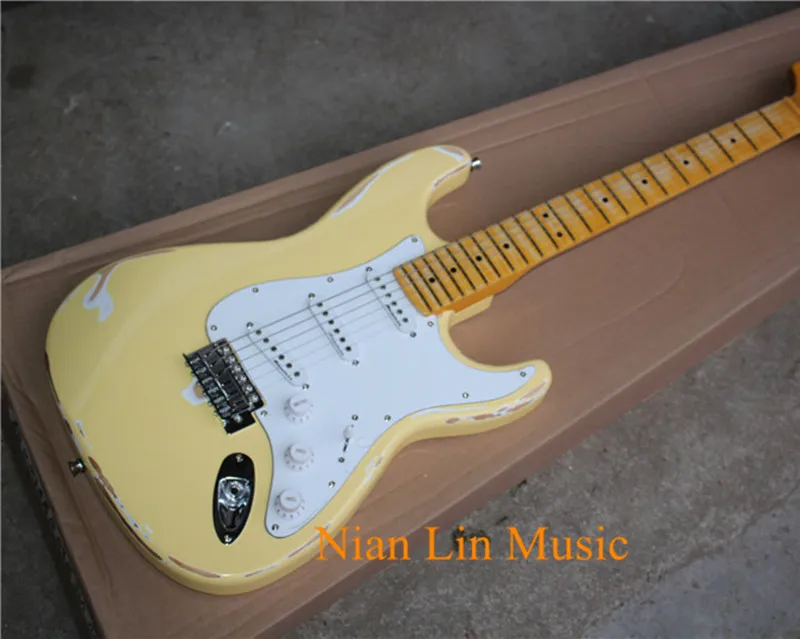

Electric Guitar,Cream Yellow Color Body,Reverse Headstock,Maple Fingerboard,22 Frets,In Relic Style,Scalloped Neck,Vintage Knobs