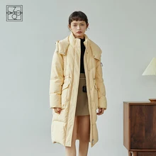 

ZIQIAO Women Three-proof Fabric Long Down Jacket 2021 Winter New Designed Niche Hooded Lightweight Jacket Light Orange Down Coat