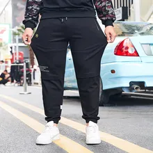 Брюки мужские тренировочные брюки мужские повседневные однотонные Большие размеры Карманные эластичные ремни свободные спортивные брюки Pantalones Hombre