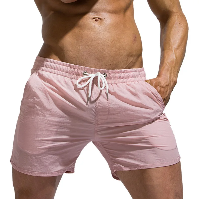 Красивые брендовые летние популярные модные шорты мужские свободные однотонные шорты мешковатые дышащие пляжные шорты с эластичной резинкой на талии мужские пляжные шорты