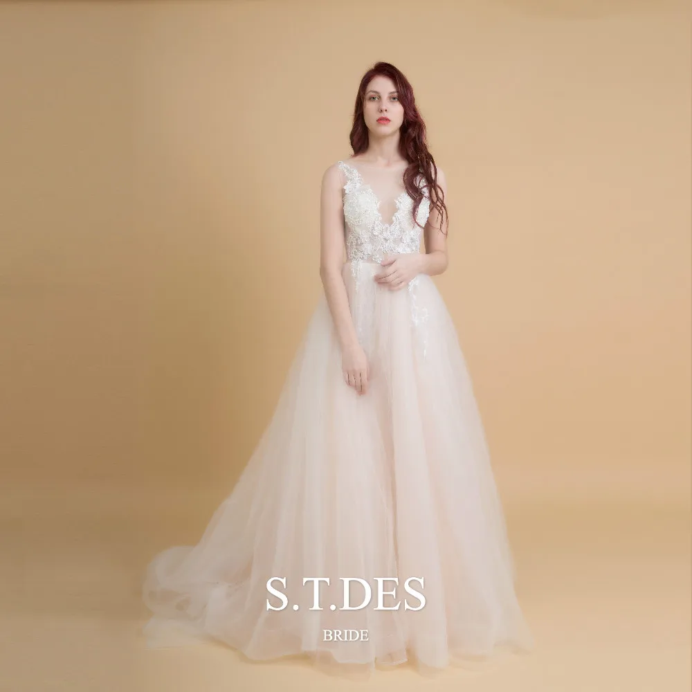 

2020 S.T.DES Sexy Ivory Jewel Sheer Neck Applique Embroidery Tull Bridal Gown Backless Illusion Sequined Wedding Dress