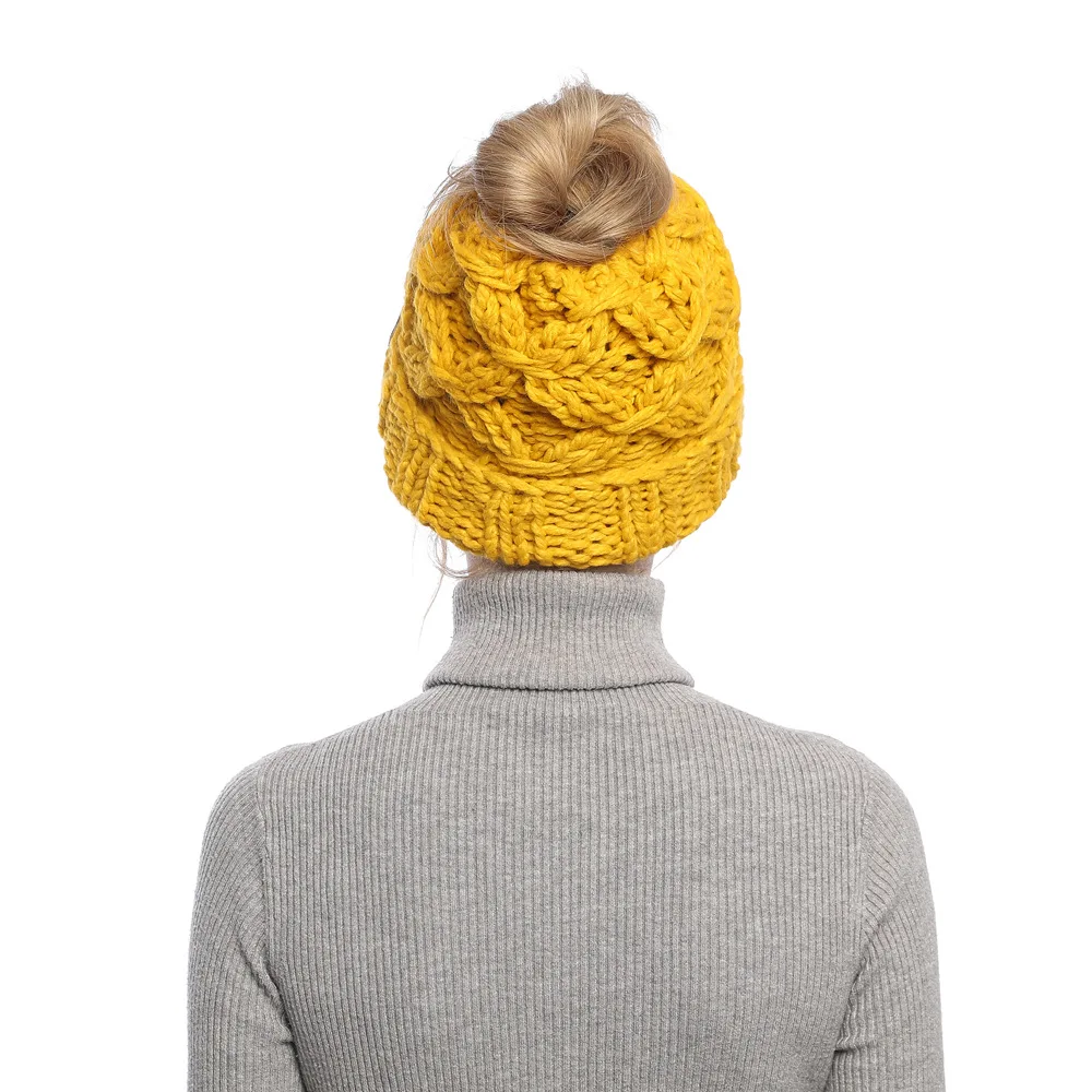 autumn and winter women's new knitted ponytail hat hair hair with an empty top hats head hats thickened to keep warm