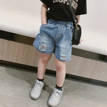 Новинка года; сезон лето; стильная детская одежда; детские джинсы с дырками; шорты для девочек в Корейском стиле; модные брюки; модные джинсовые шорты