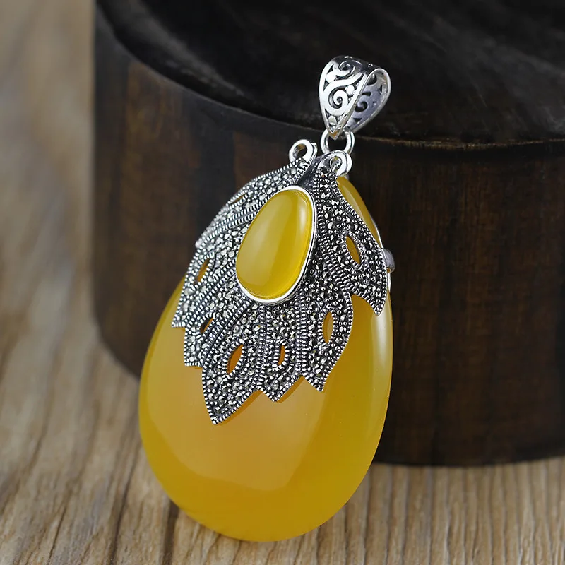 

Ms character silver items S925 pure silver ornaments ethnic atmosphere wind topaz pulp pendant