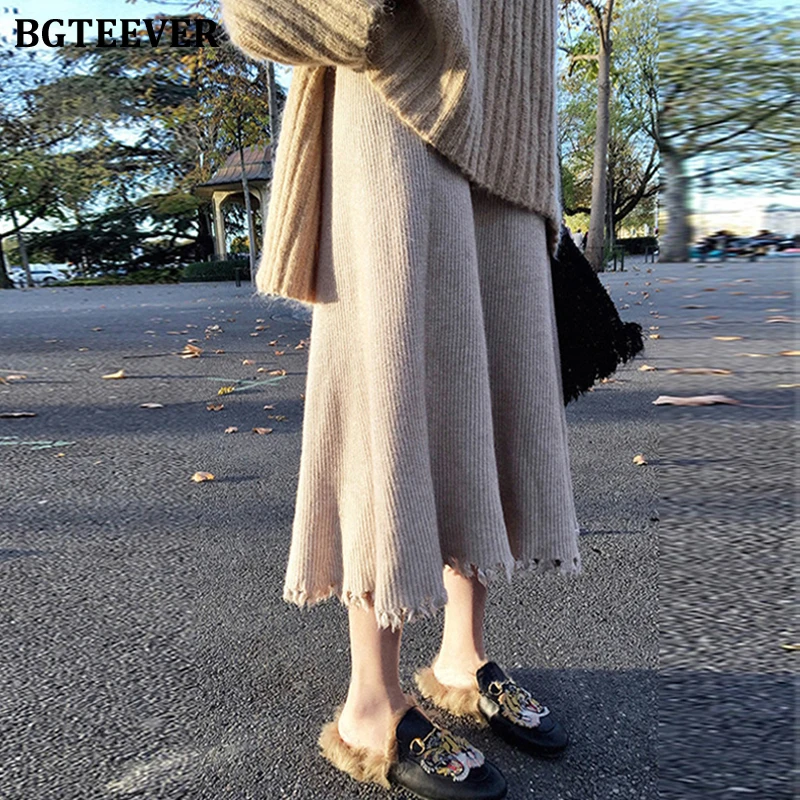 BGTEEVER осень зима толстый женский свитер юбка высокая талия трапециевидной формы женские трикотажные юбки плиссированные с кисточками элегантная женская юбка