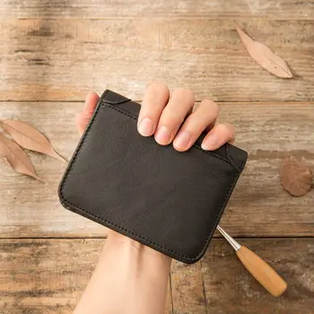 

New leather men's wallet first layer of leather casual simple short three-fold black handmade multi-card vertical wallet purse