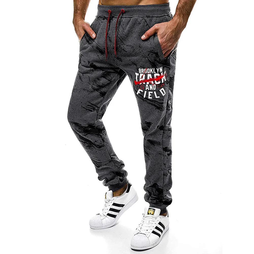 

2019 New Style Ouma Men Trendy Letters Printed with Drawstring Belt Beam Leg Casual Pants 7155