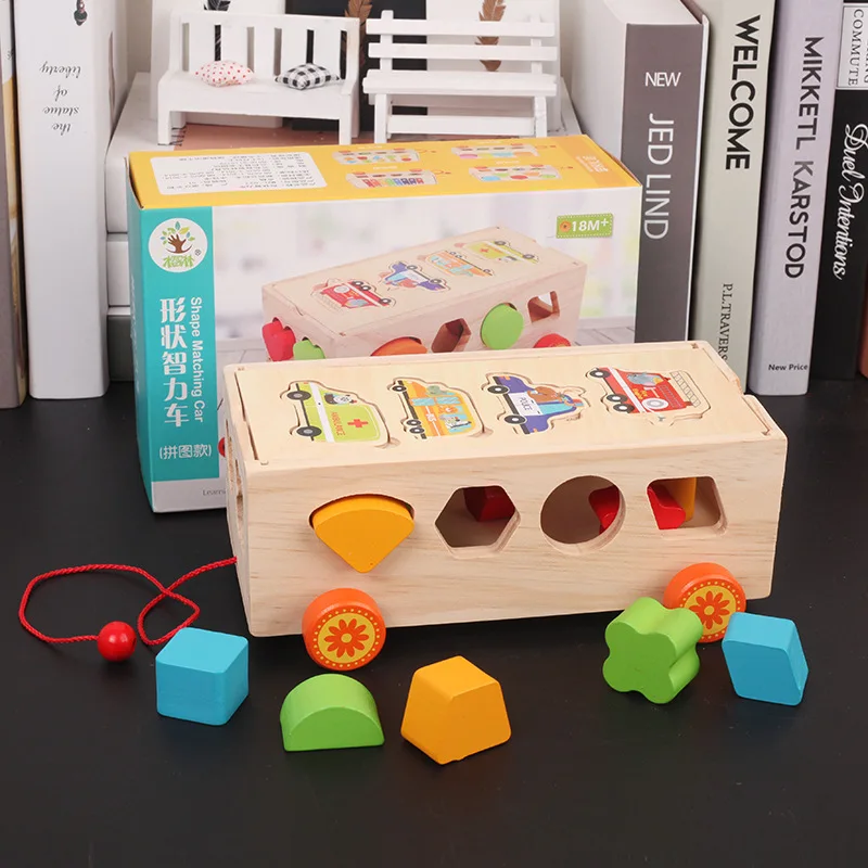 

Early Education Drag Toy Unit Blocks on Wheels 15 Hole Drag zhi hui he Geometric Shapes Matching Trailer Cognitive Box Classific