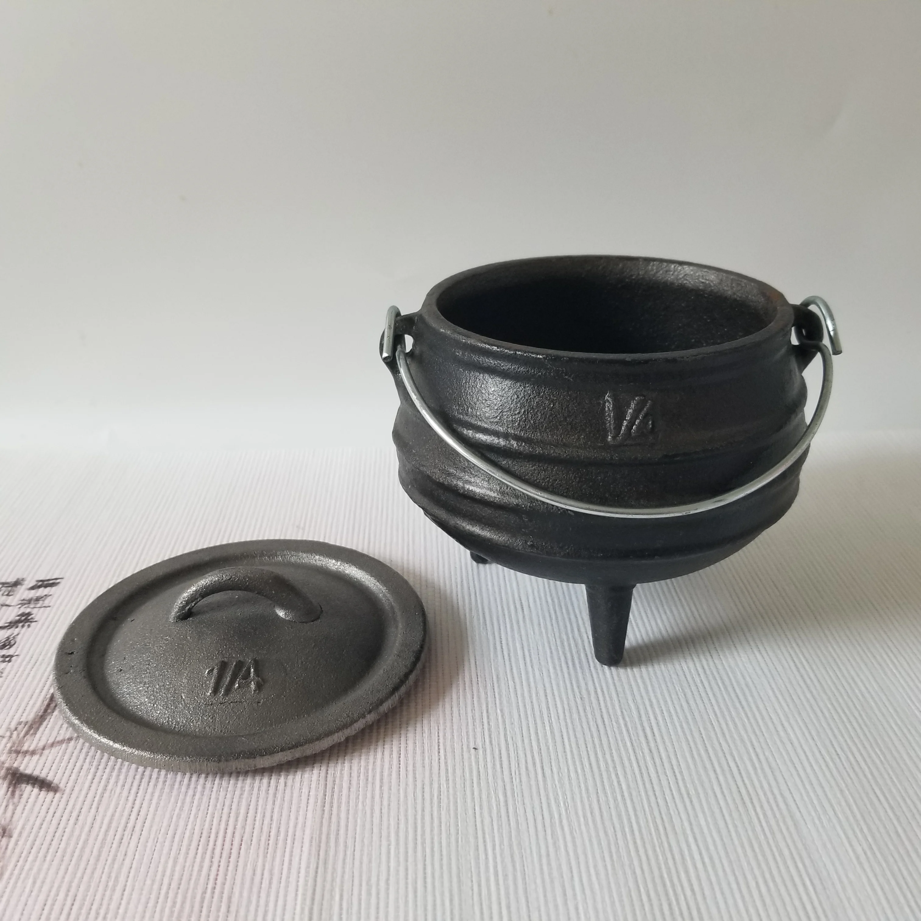 https://ae01.alicdn.com/kf/H21dffc8431544951a483dc215592494df/1-4-Cast-Iron-Cauldron-Magic-Pot-Cooking-Potjie-Perfect-for-Incense-Smudge-Kit-Sage-Holder.jpg