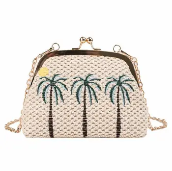 

New type of small fresh lady wrapped straw embroidery pineapple shell wrapped with chain clip and one shoulder inclined bag in 2