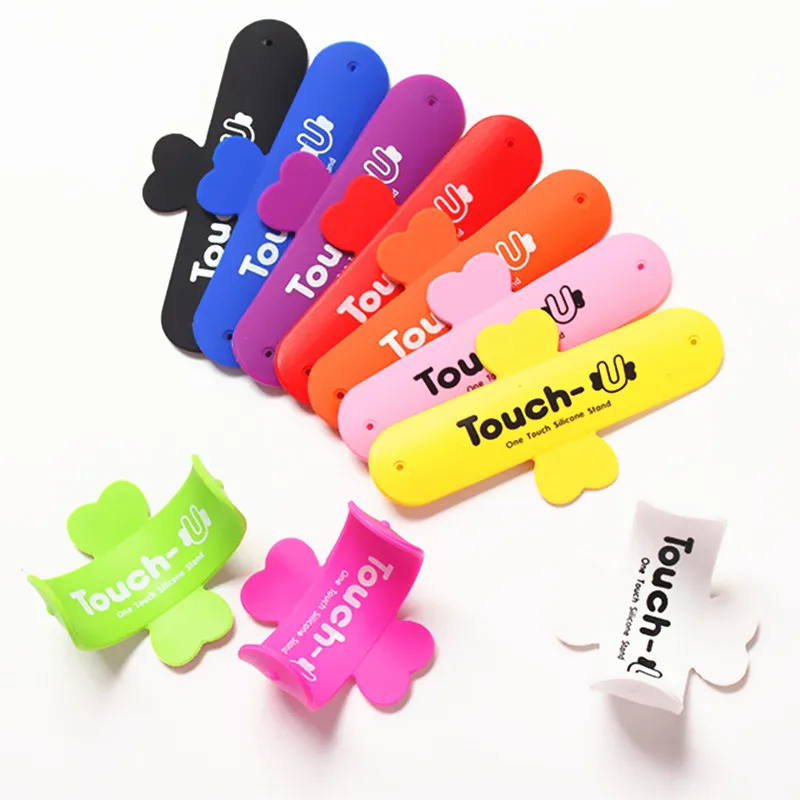 

Silicone Touch U Shaped Phone Holder for IPhonexs Samsung Xiaomi Stand Magic Stickers Sucker Phone Bracket Random Color