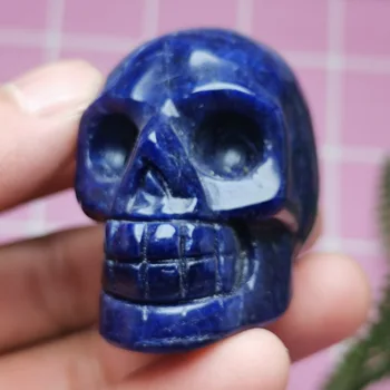 

Natural blue stone, hand-carved crystal skull can be placed to heal healing