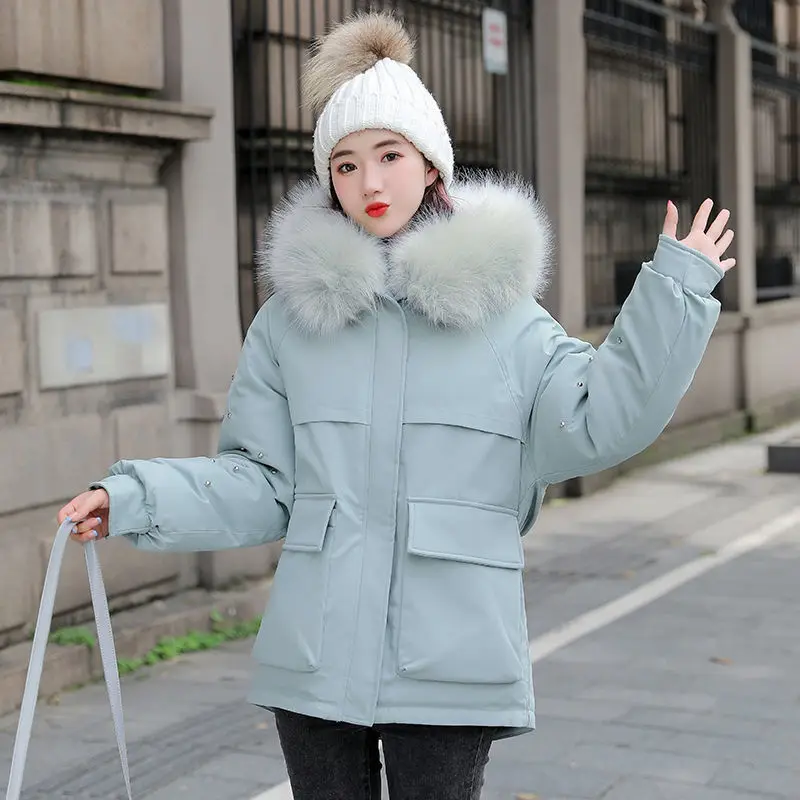 

New Winter Parka Coat Women Big Fur Hooded Jacket Coats Woman Warm Hooded Cotton Coats Female Down Cotton Jackets Rivet Outwear