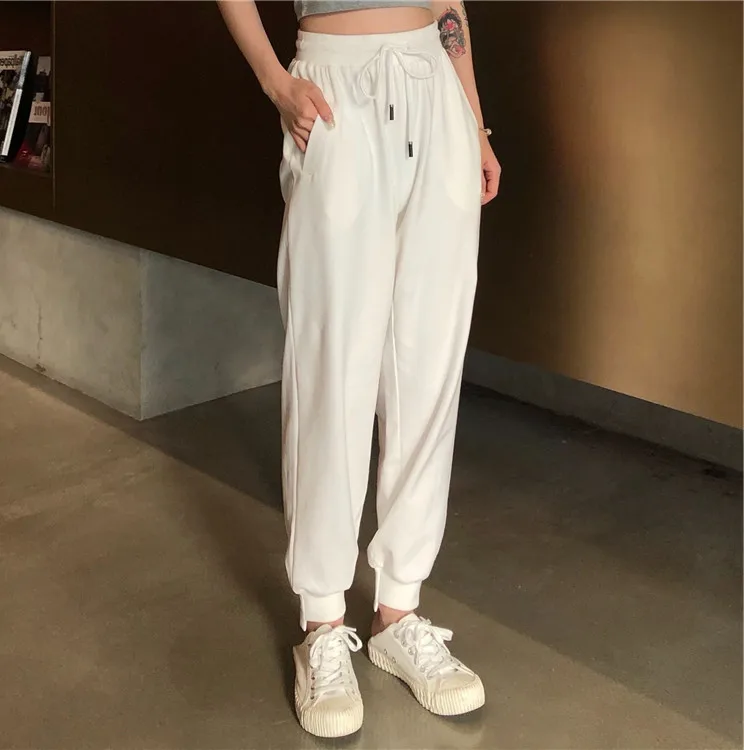Korean chic White High Waist Harem Pants Women Casual Loose Black Long Pants Female Summer Pocket Lace-up Elastic Trousers