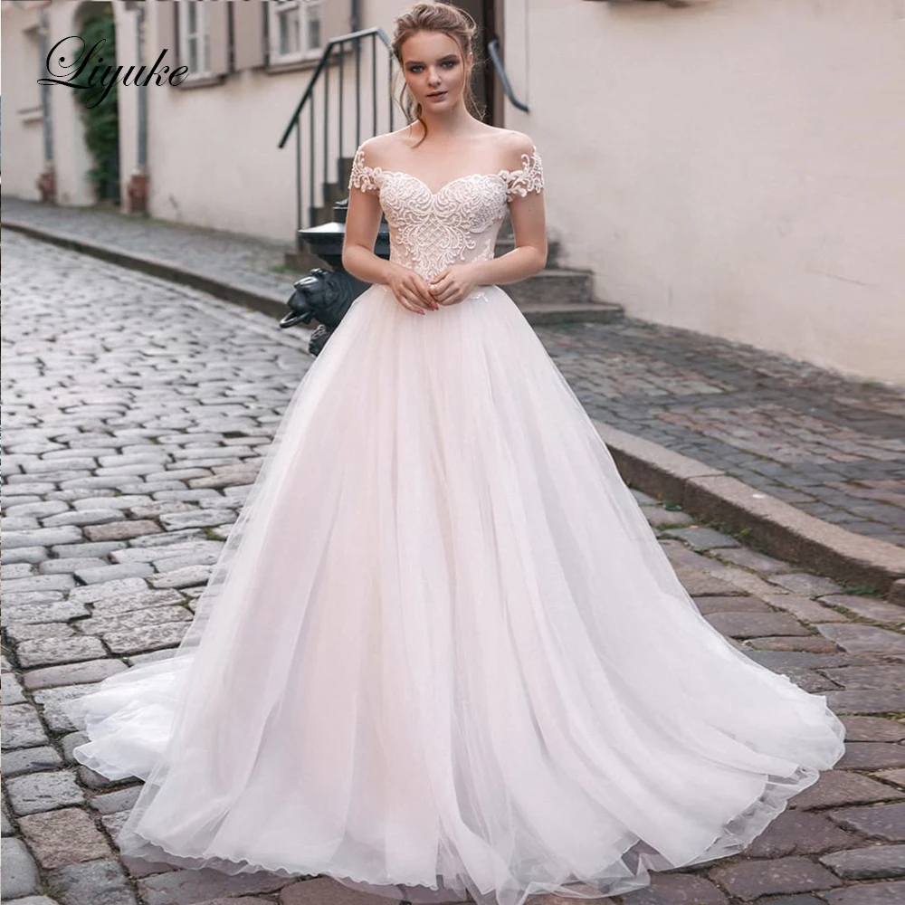 

Liyuke Ivory Color A Line Wedding Dress With Gorgeous Lace Zipper Back Of Bridal Dress